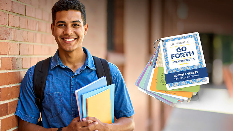 College student holding Go Forth Bible verse cards and notebooks—Christian gift idea for college students