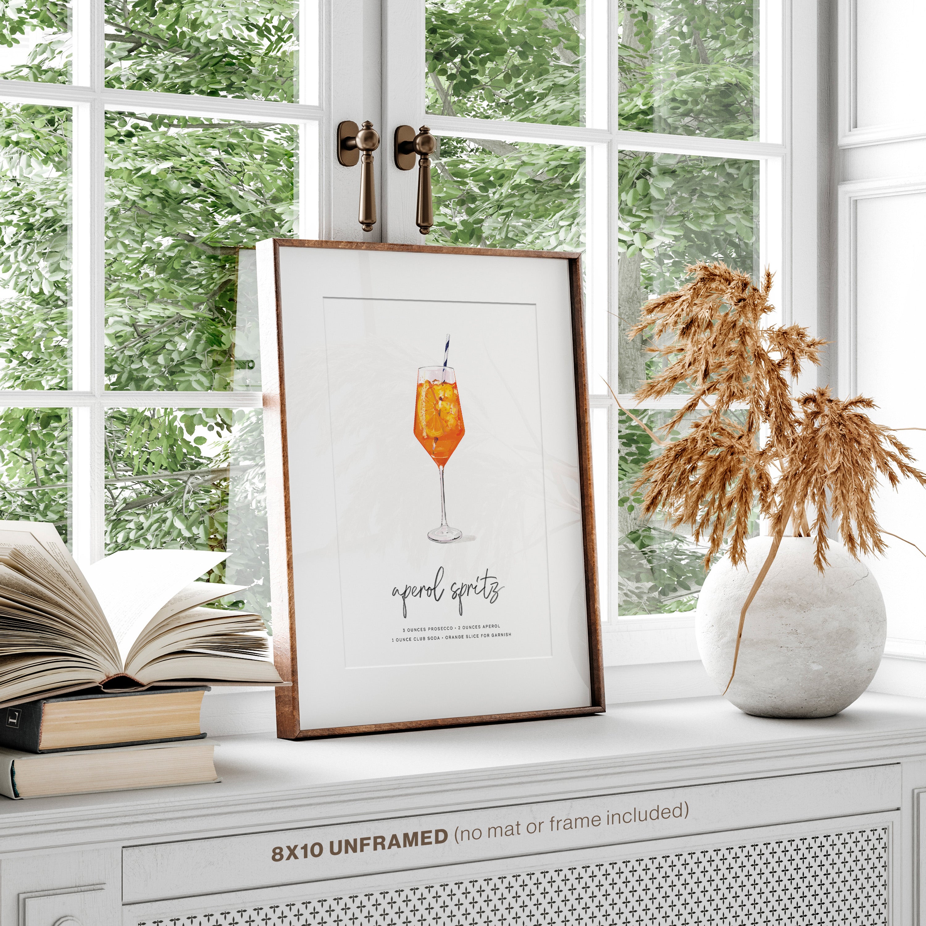 Aperol Spritz cocktail wall art framed and displayed in a bar and kitchen decor setting
