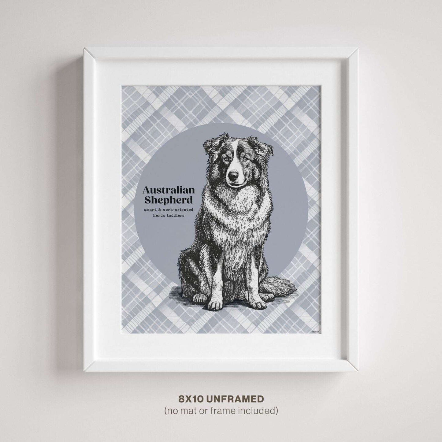 Australian Shepherd drawing shown in a white frame with a mat on a bedroom wall.