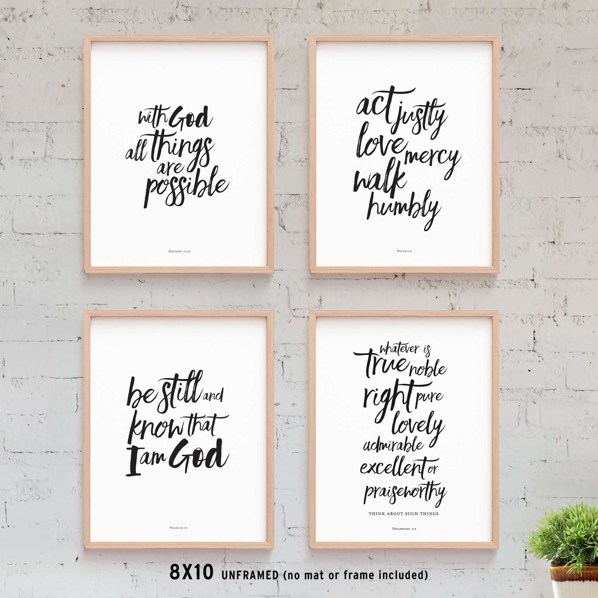 Modern brush calligraphy Bible verse wall art on a brick background, featuring minimalist designs with faith-inspired quotes in black and white.