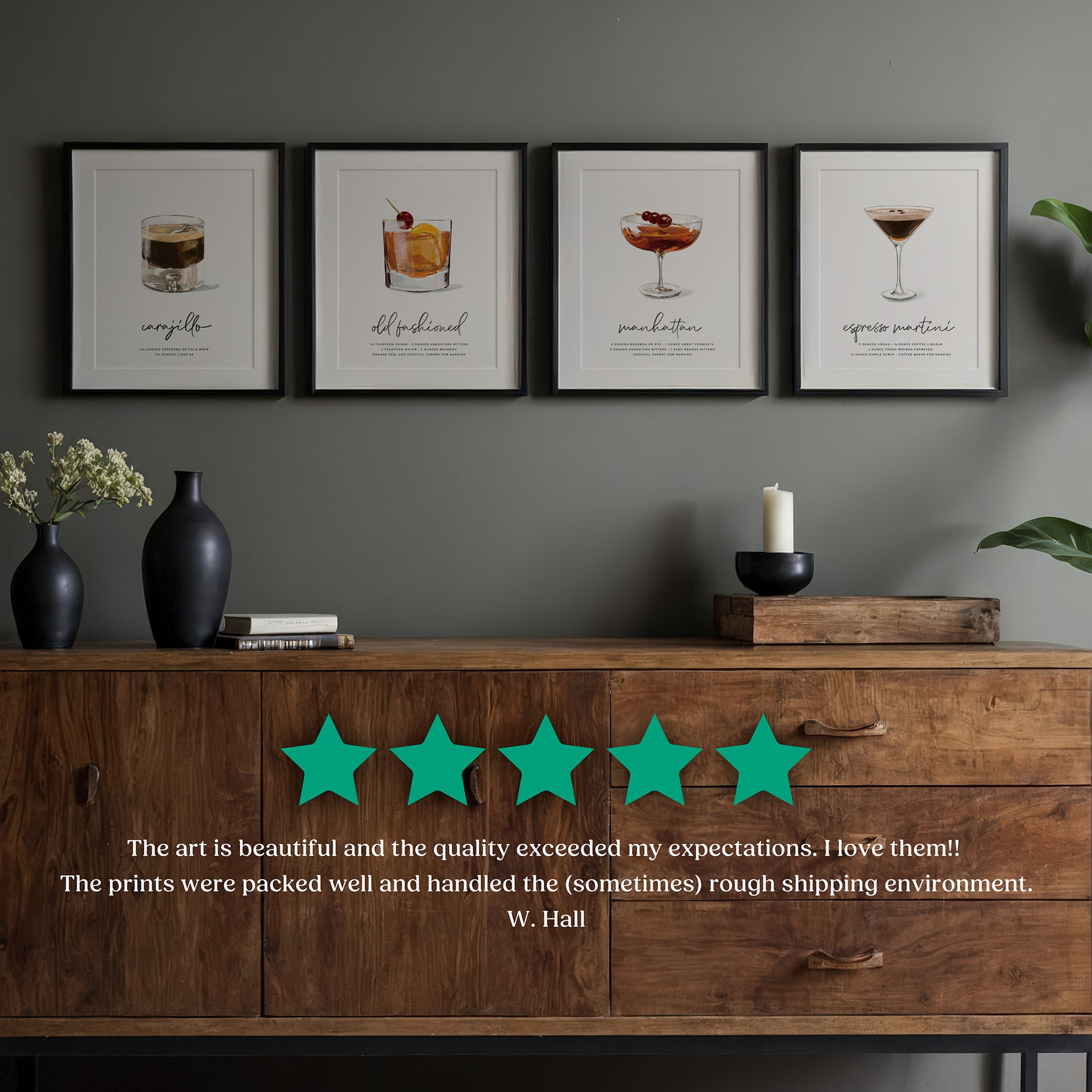 Framed cocktail illustrations on a wall above a wooden console table with five-star rating text.