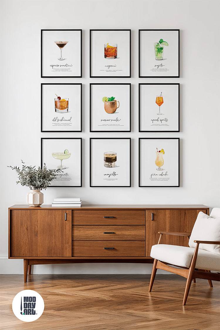 Modern living room with wooden sideboard and framed Mod Day Art cocktail wall art  illustrations on the wall.