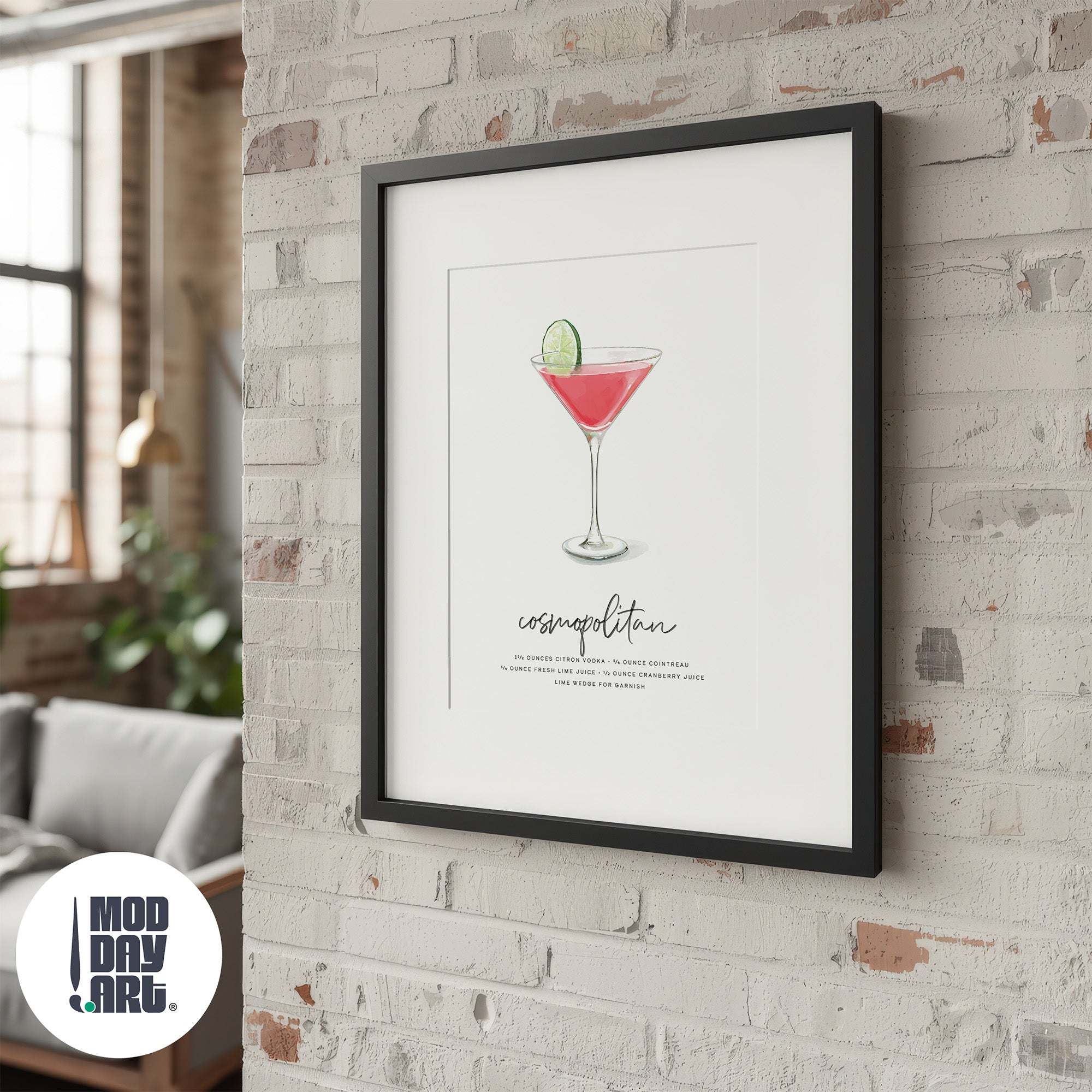 Framed artwork of a cosmopolitan recipe cocktail on a brick wall with 'Mod Day Art' logo.
