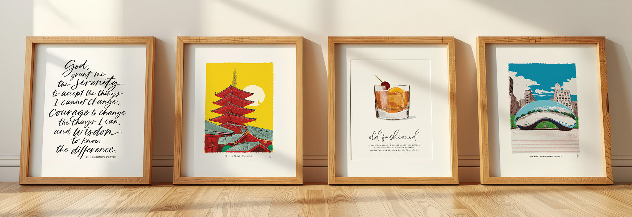 Four framed art prints by Mod Day Art on a wooden floor leaning against a wall