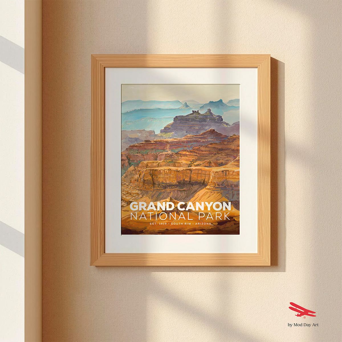 Framed poster of Grand Canyon National Park on a beige wall