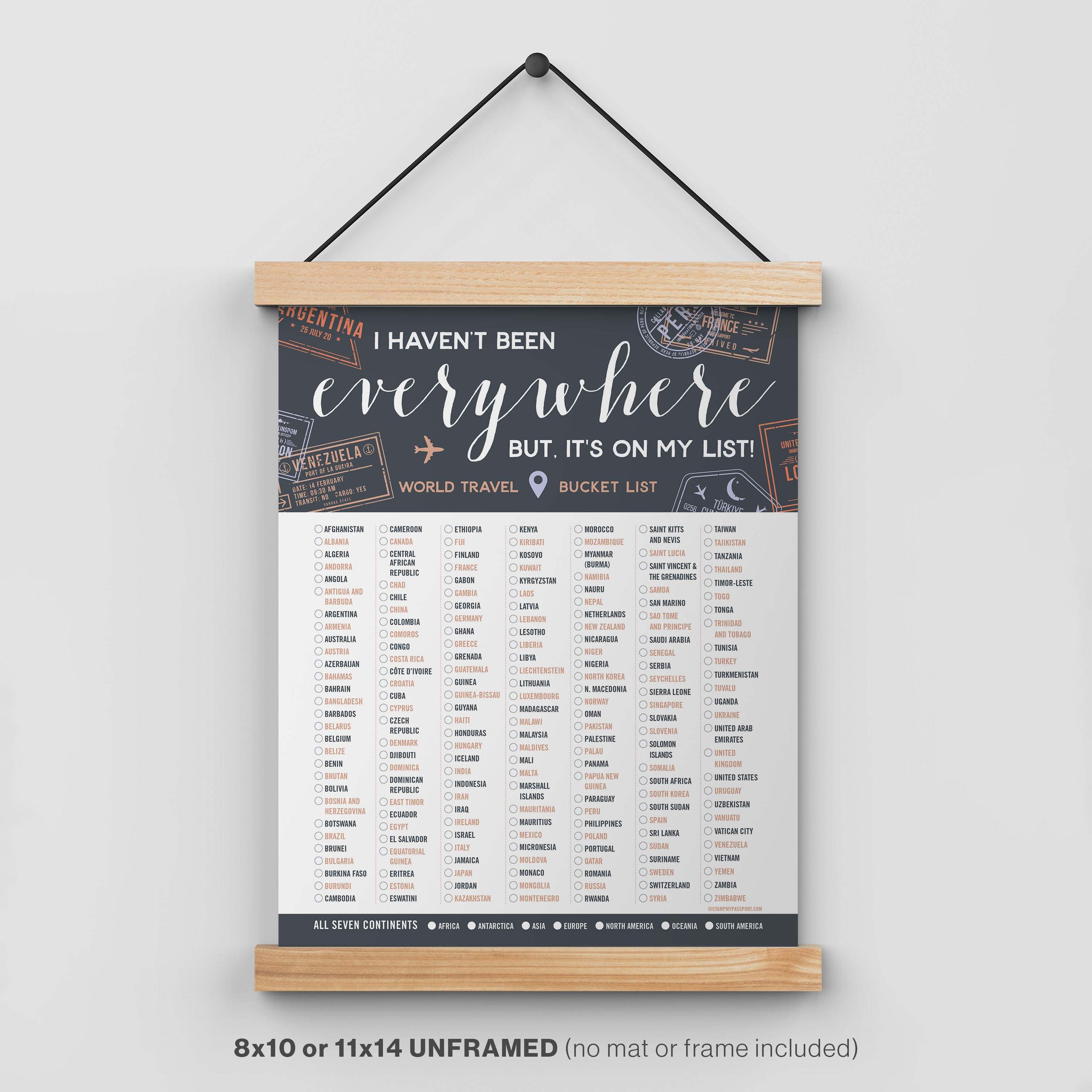 Travel bucket list poster with wooden frame on a white background