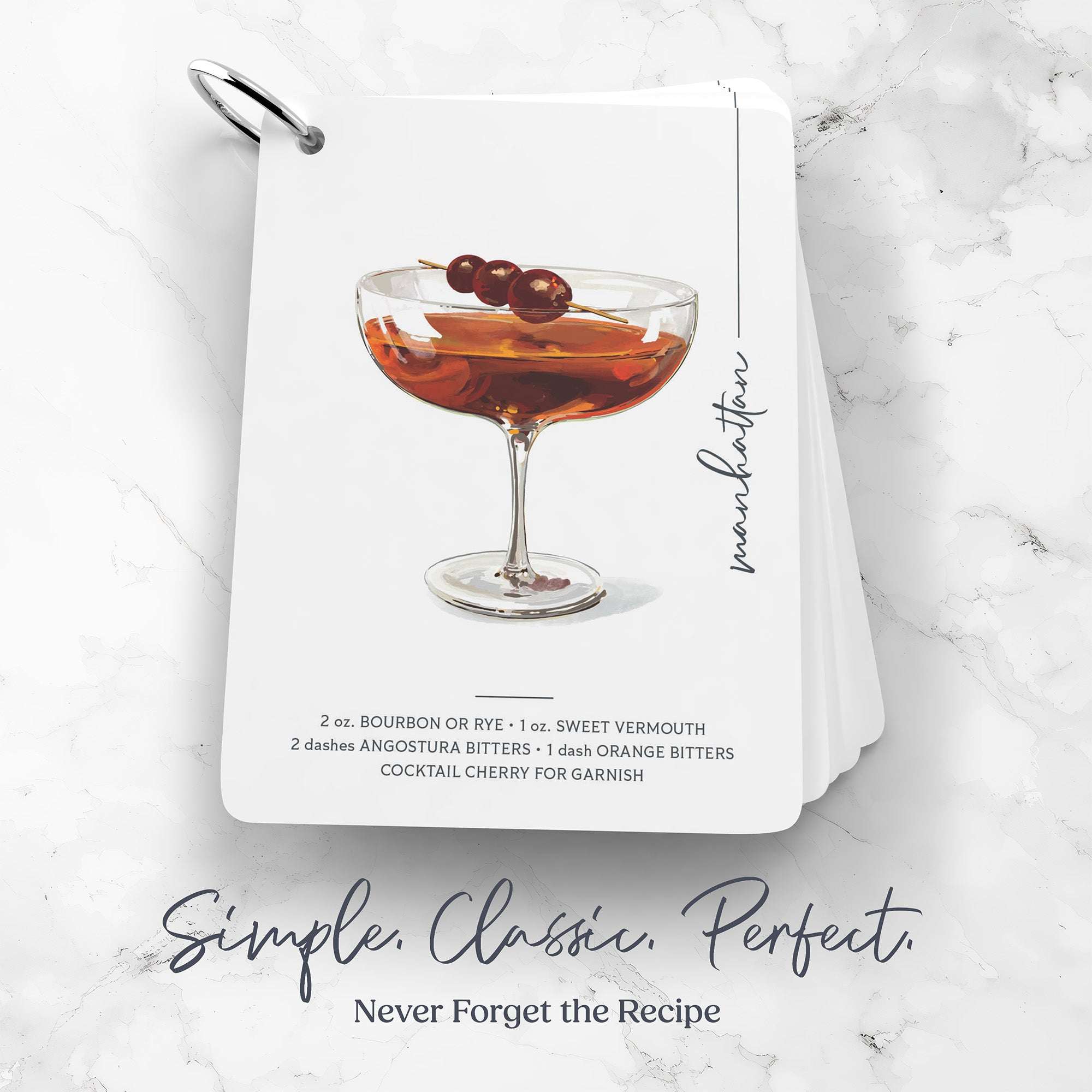 'Illustrated Mixology' Cocktail Flashcards with a Manhattan cocktail art on a marble surface