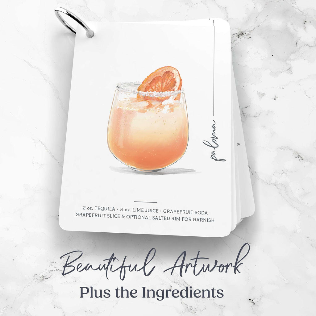Cocktail flashcard book with a Paloma cocktail illustration and recipe on a marble surface