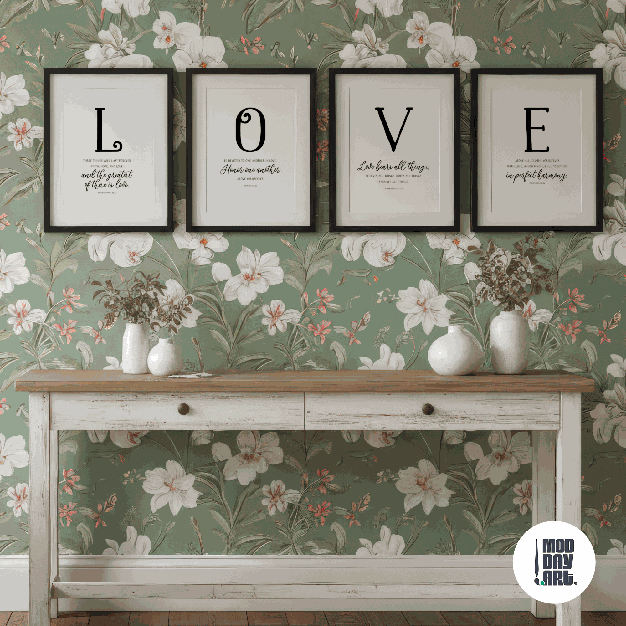 Decorative wall with floral wallpaper, framed modern Christian wall art spelling 'LOVE', and a wooden console table.