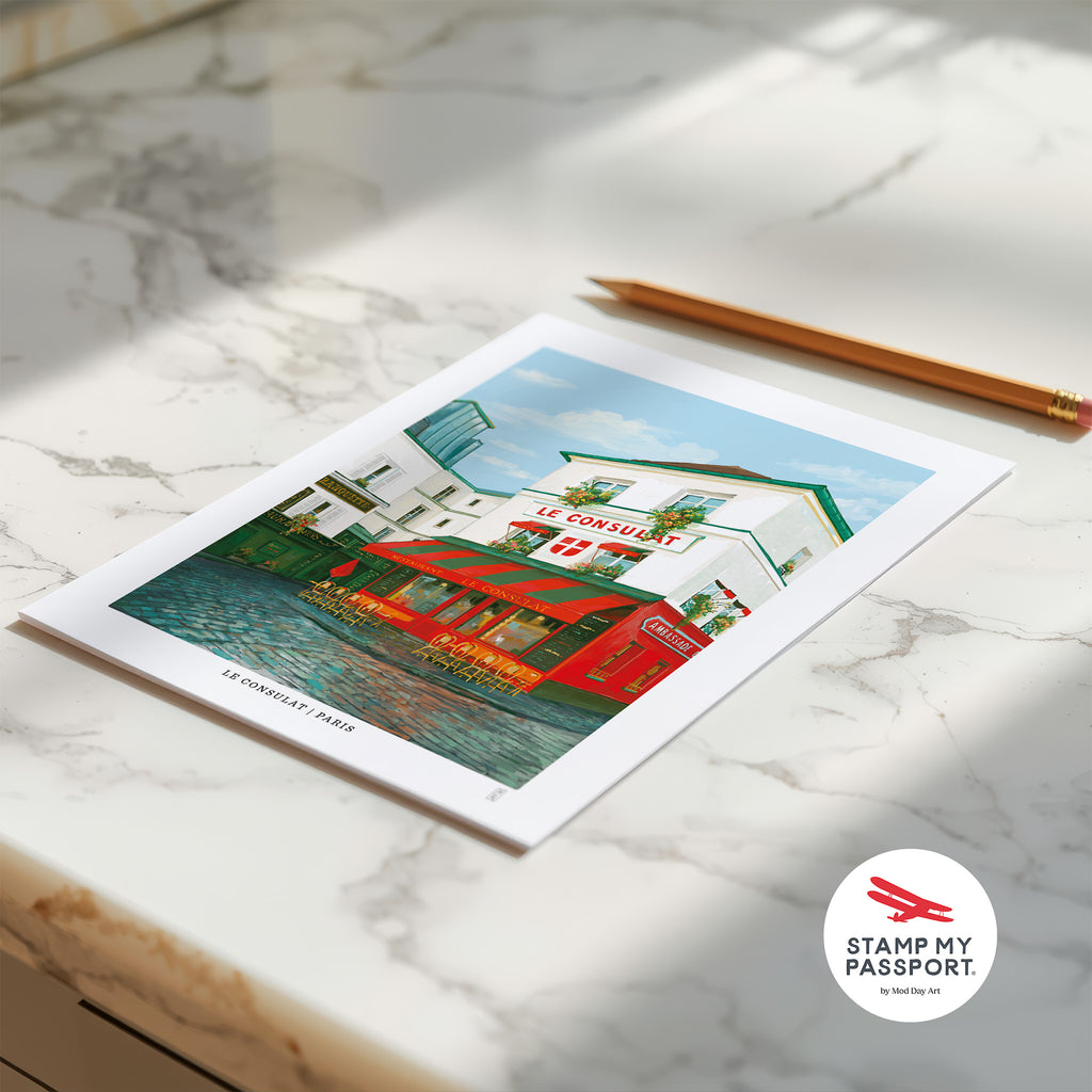 Art Print of Le Consulat cafe in Paris  on a marble surface, featuring 'Stamp My Passport' logo.