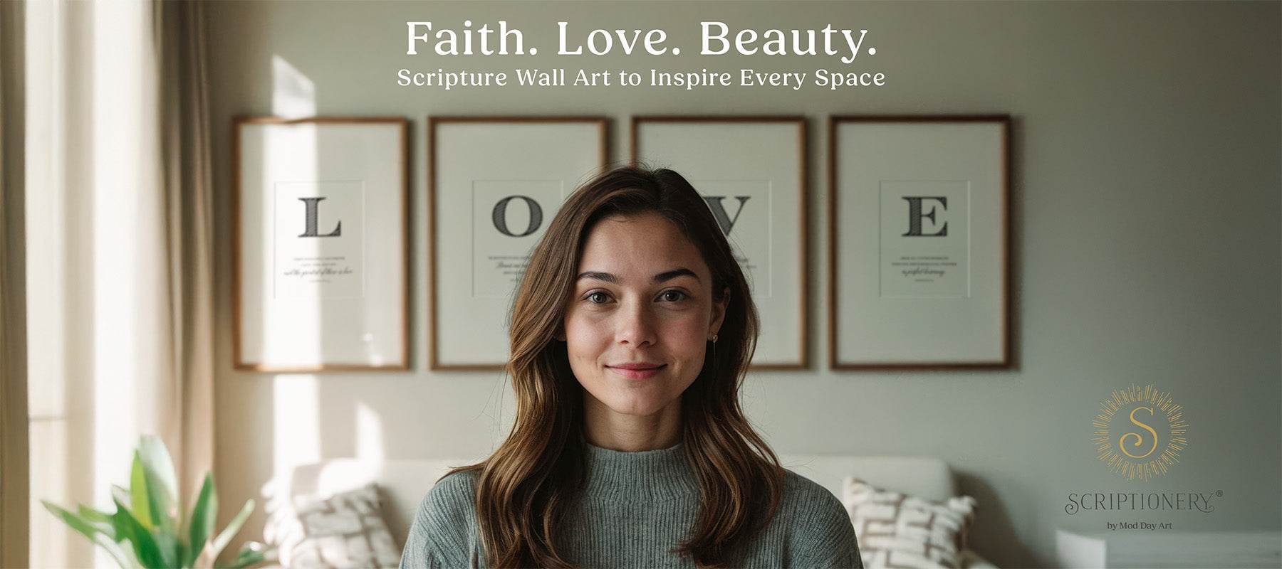 Woman standing in a room with framed LOVE modern Christian wall art.