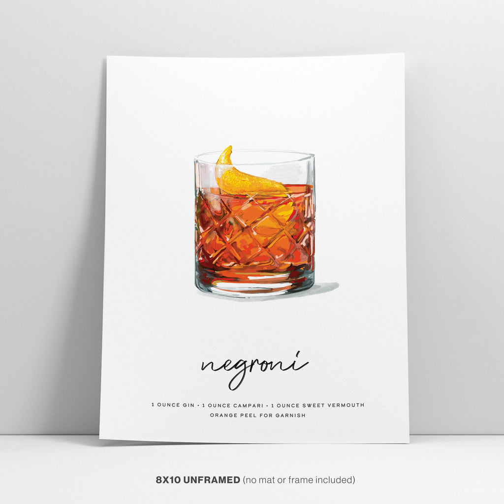 Negroni cocktail art print featuring classic recipe in cut crystal glass with orange peel garnish. 8x10 unframed minimalist bar decor illustration with ingredients listed below elegant script lettering.