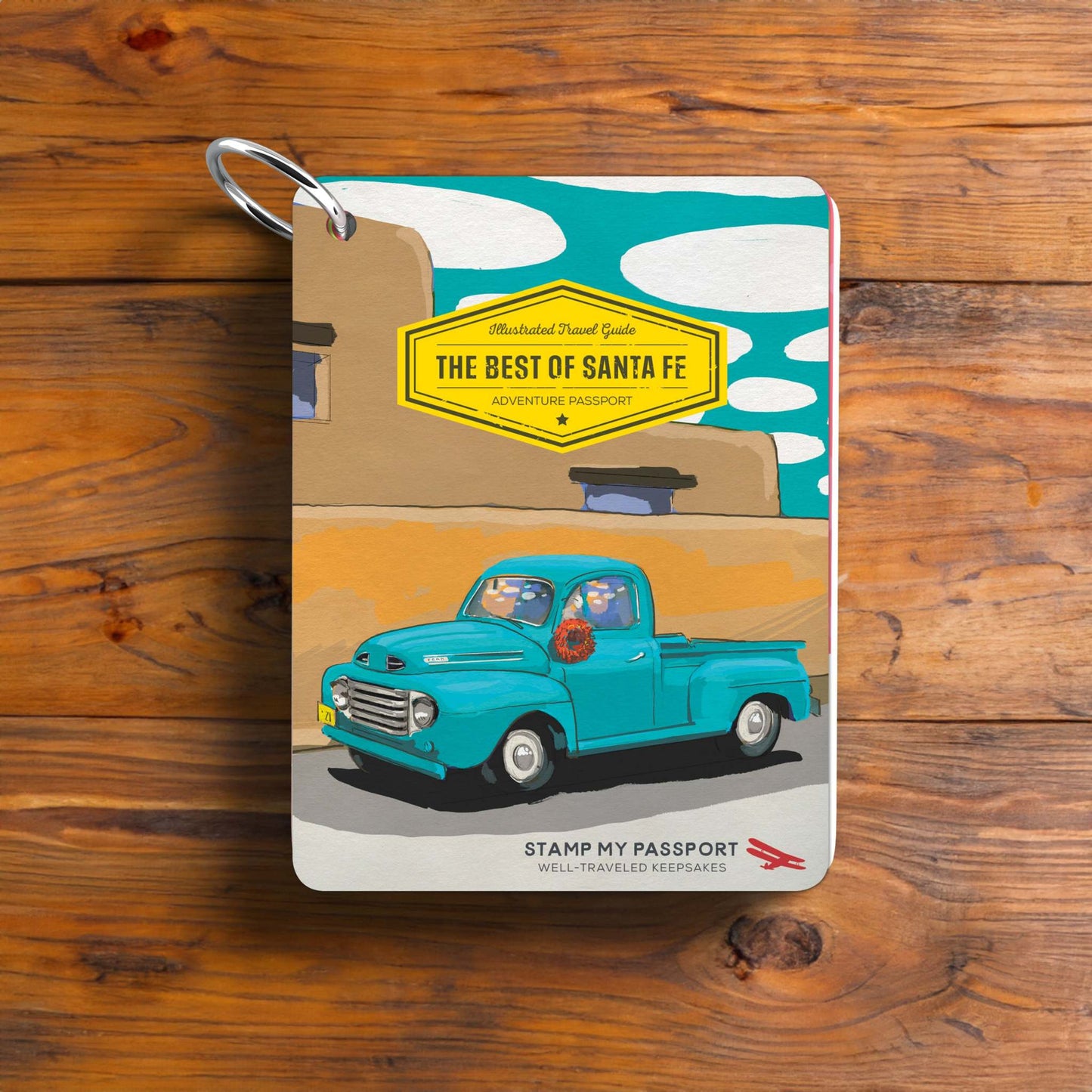 Santa Fe Illustrated Travel Keepsake with vibrant cover design featuring a classic truck and local landmarks.