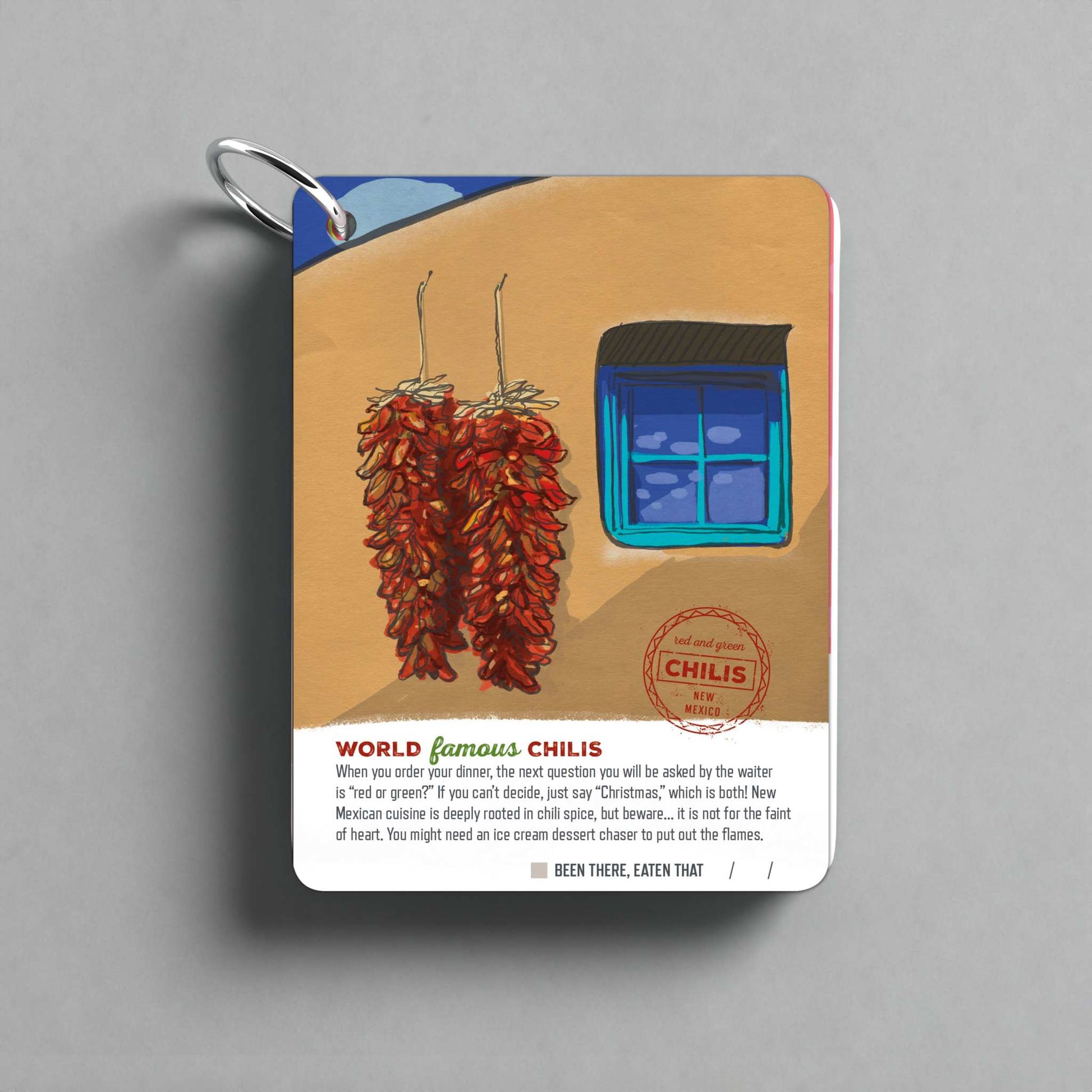 Santa Fe Illustrated Travel Keepsake with vibrant chili and blue window design.