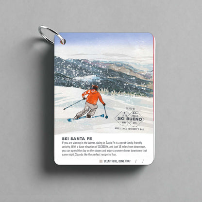 Santa Fe Illustrated Travel Keepsake featuring skier on snowy mountain.