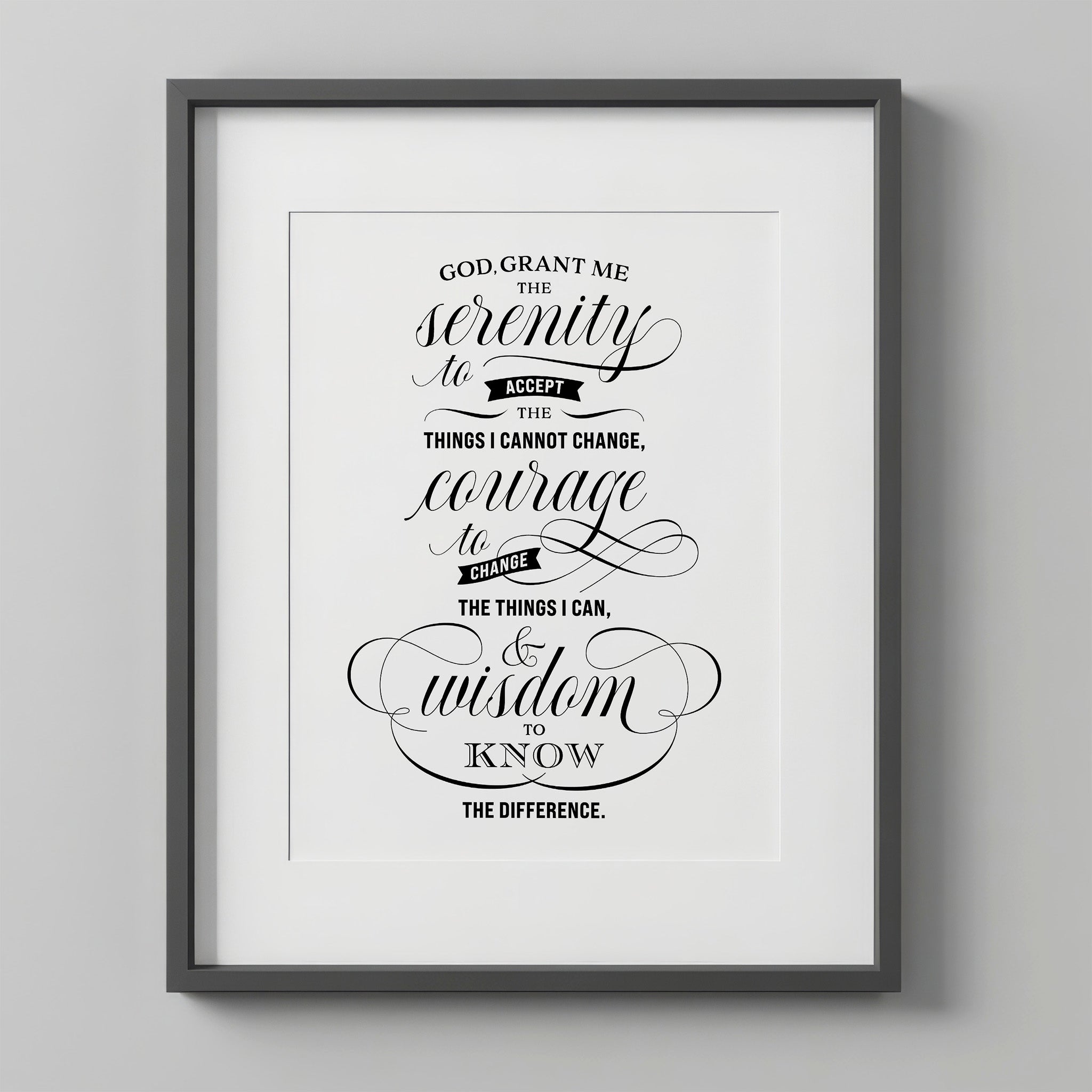 Serenity Prayer Wall Art print in elegant script typography, unframed with a wide white border. The prayer's key words - serenity, courage, and wisdom - are lettered in flowing black script, the rest in bold serif caps.