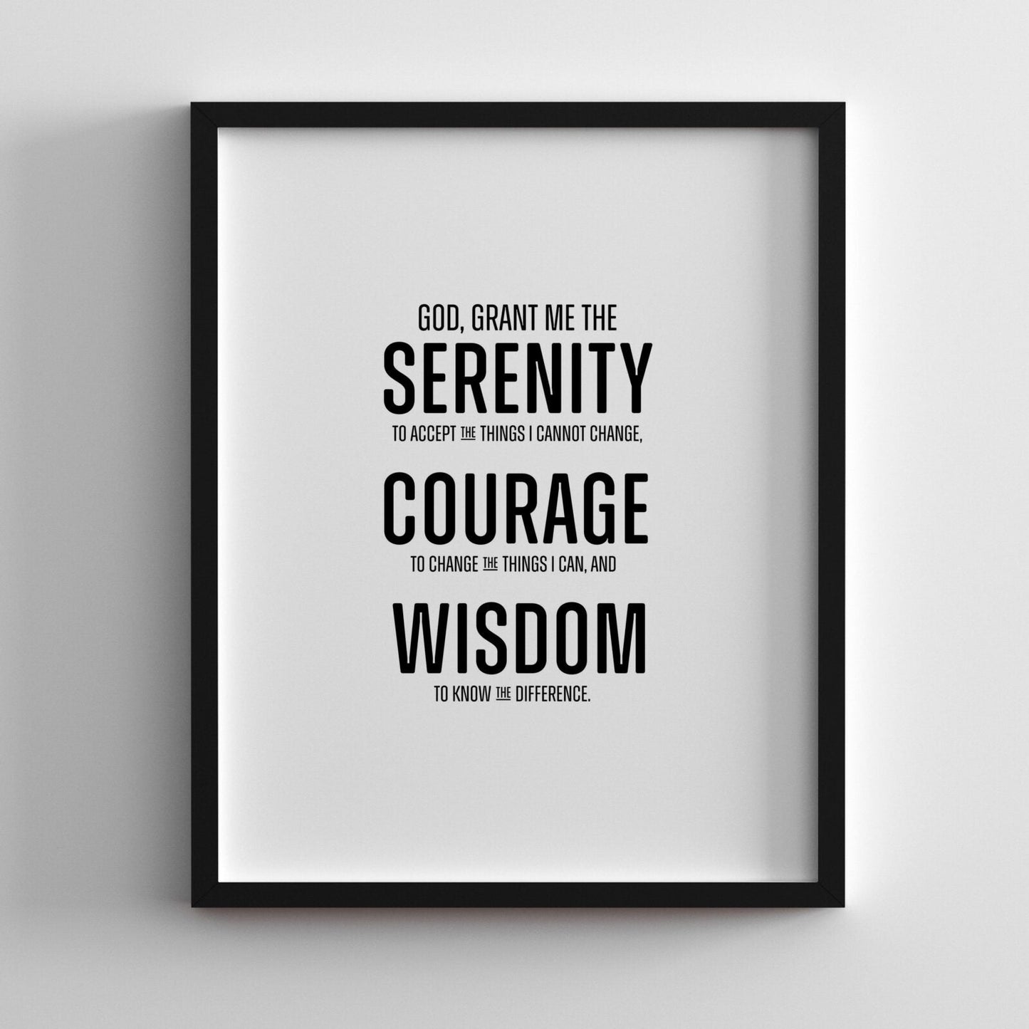 Serenity Prayer wall art in block print style with "God grant me the serenity" quote, minimalist black and white typography.