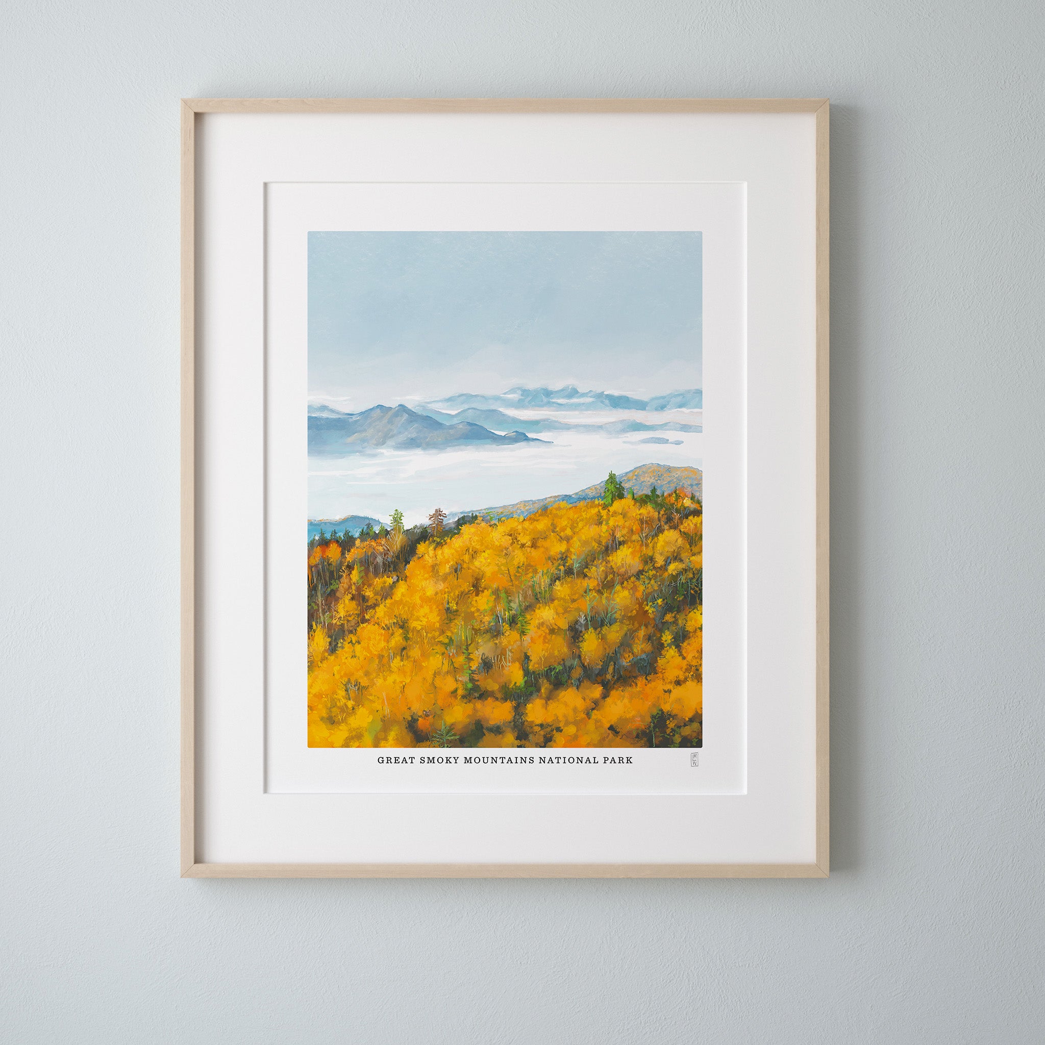 Framed print of a Smoky Mountain National park landscape with yellow trees and blue sky.