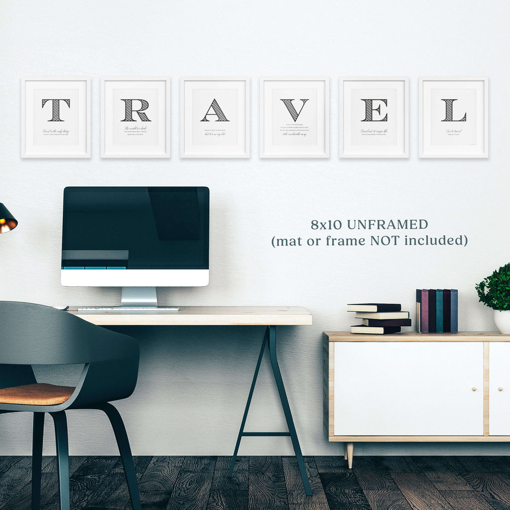 Minimalist TRAVEL travel wall decor set with inspirational quotes in black-and-white typography above a modern desk setup