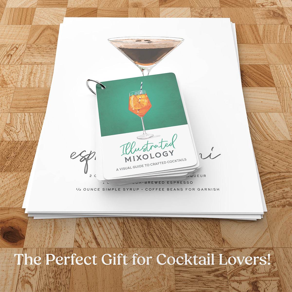Illustrated Mixology cocktail cards on a wooden surface with text 'The Perfect Gift for Cocktail Lovers!'.