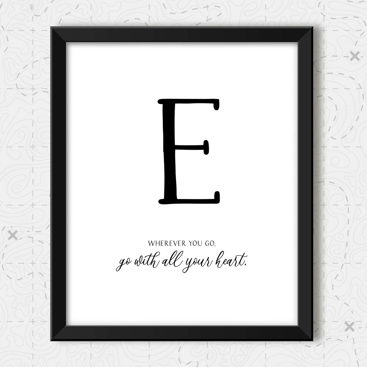 Wander Quotes Wall Art detail of the letter "E".