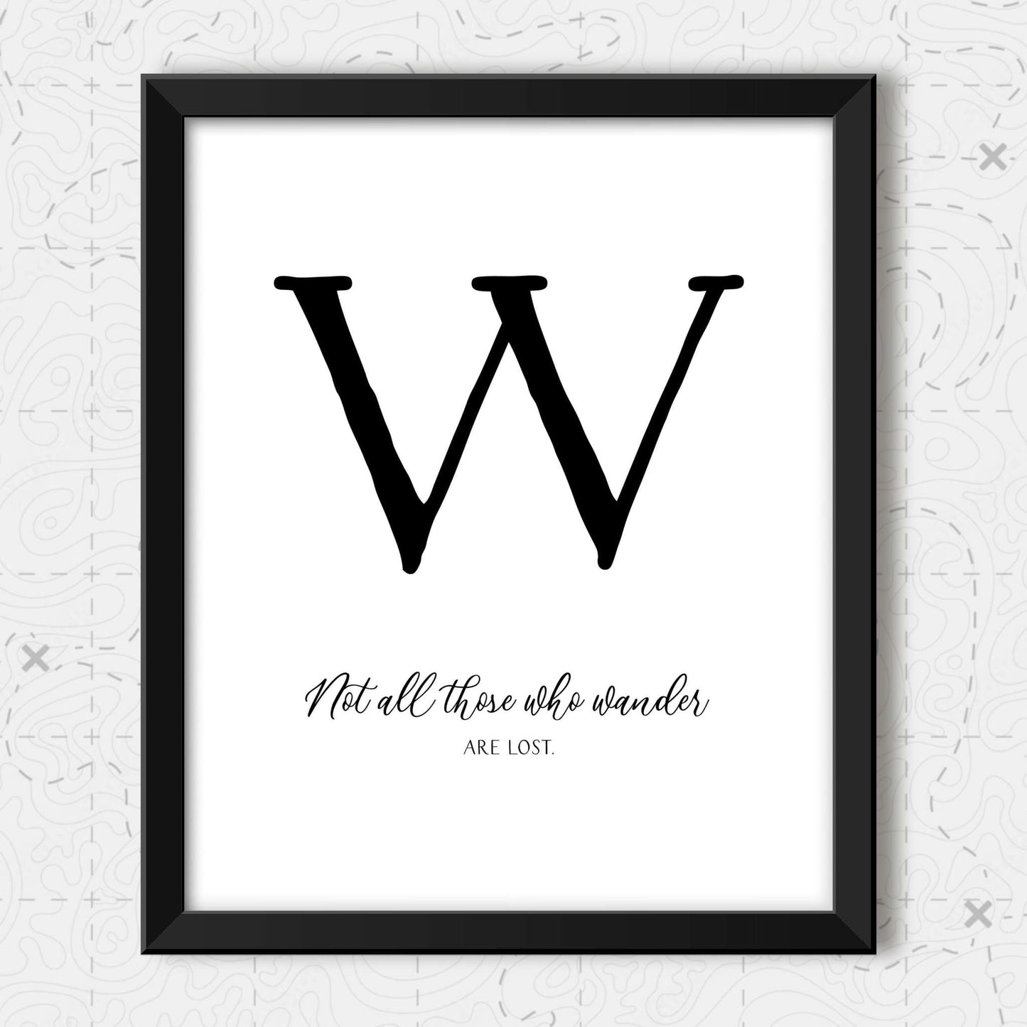 Wander Quotes Wall Art detail of the letter "W".