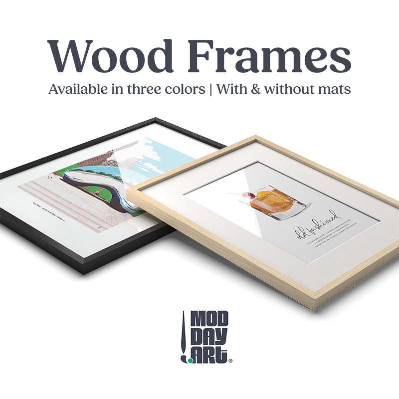 Need a Frame? promotional banner for the Premium Oak Picture Frame, showing a black-finish frame with a framed city art print and a natural oak frame with a framed Old Fashioned cocktail print, side by side. Text reads: available in three colors, with and without mats.
